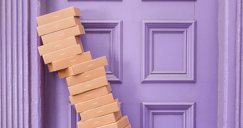ecommerce shipping boxes at door feature