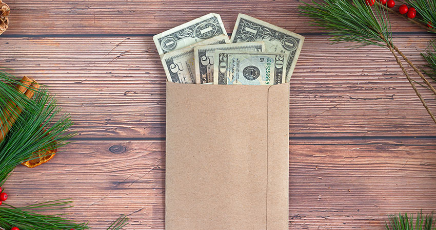 holiday spending bux in envelope feature